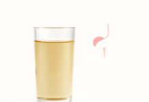 Blood in Your Urine After a UTI: When to Get It Checked Illustration of a urine sample with a subtle pink tint representing UTI bleeding