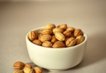 Brazil Nuts And Selenium: Why A Small Serving Can Add Up A small bowl of Brazil nuts illustrating how many brazil nuts a day can add substantial selenium.