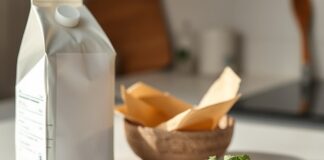 How to Get Enough Iodine on a Vegan Diet Iodised salt, nori and a plant-based drink arranged as possible vegan iodine sources